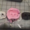 I created a mold using the Sculpy nose, and from that cast a silicone nose